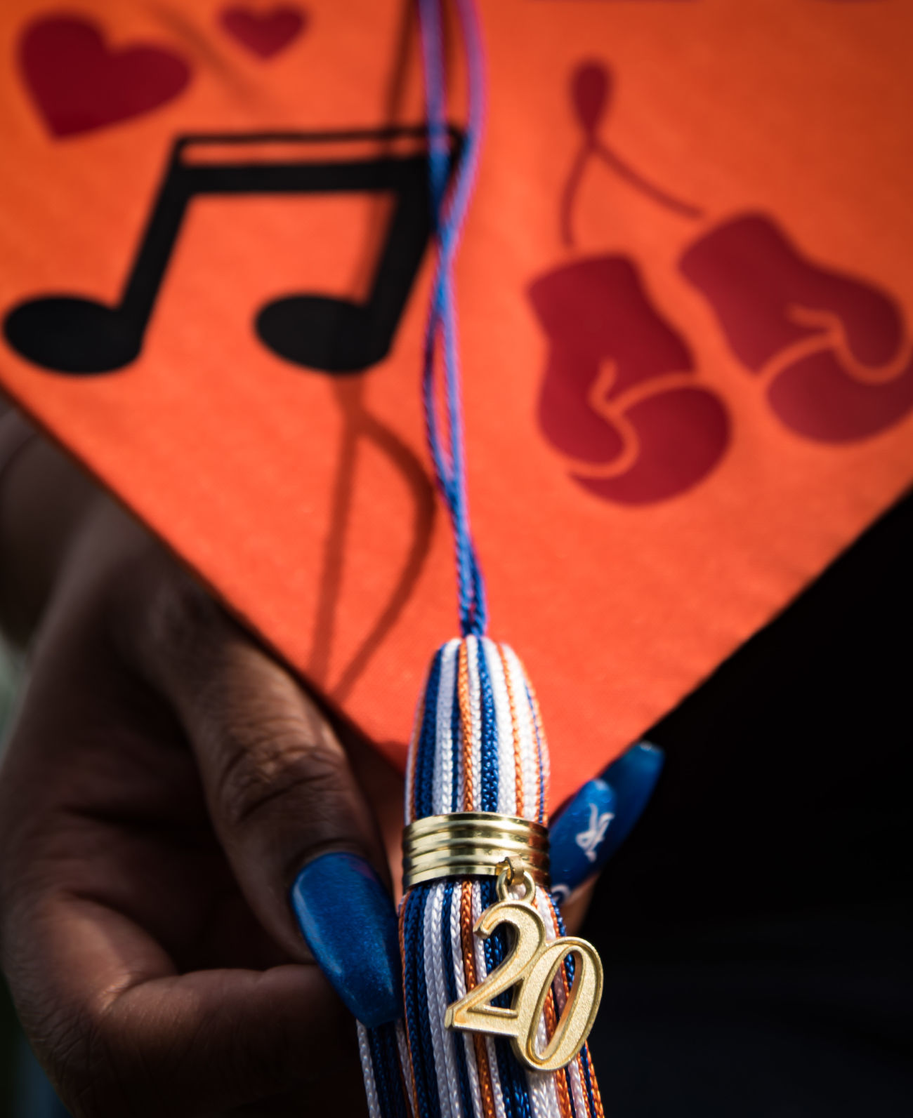 Nakeshia Collins accepts Glenn diploma for son Jumil Robertson